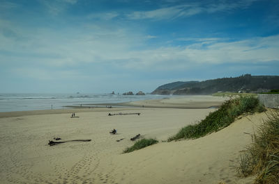 Scenic view of beach against sky