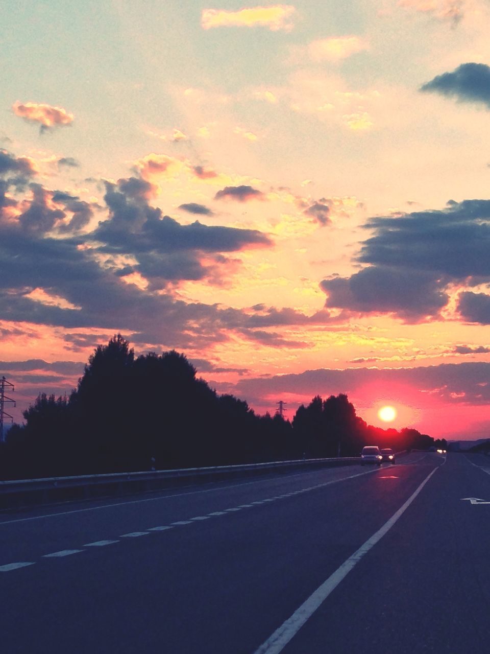 sunset, transportation, road, sky, road marking, car, cloud - sky, the way forward, orange color, land vehicle, mode of transport, street, silhouette, diminishing perspective, scenics, cloud, beauty in nature, nature, outdoors, cloudy