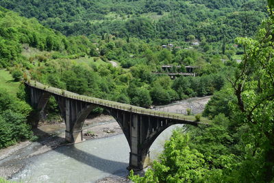 Arch bridge over river