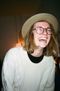 Close-up portrait of a smiling young woman