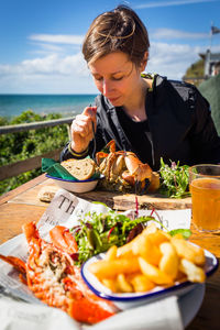 Young woman eating food