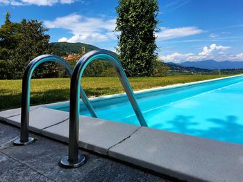 Trees against blue sky and clouds