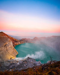 View of lake against sky during sunset