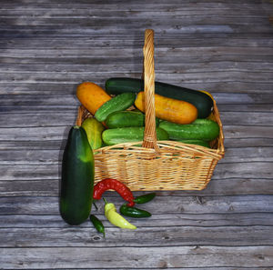 High angle view of bell peppers in basket on table