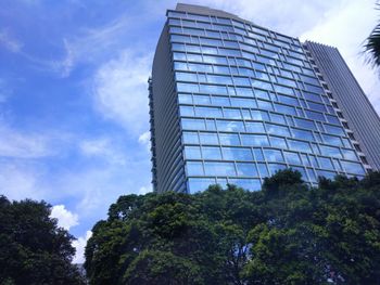 Low angle view of skyscraper against sky