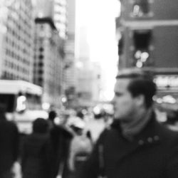 People walking on road in city