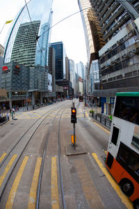 City street amidst modern buildings