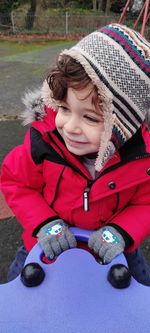 Blue eyed boy looking away from camera