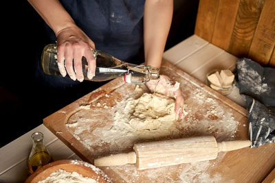 Midsection of woman preparing food