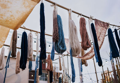 Low angle view of ropes hanging against clear sky