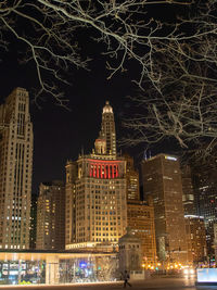 Illuminated buildings in city at night