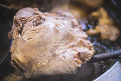 Close-up of meat on barbecue