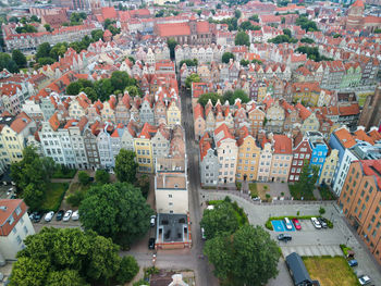High angle view of street amidst buildings in town