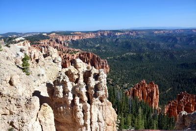 High angle view of rocky mountains against clear sky