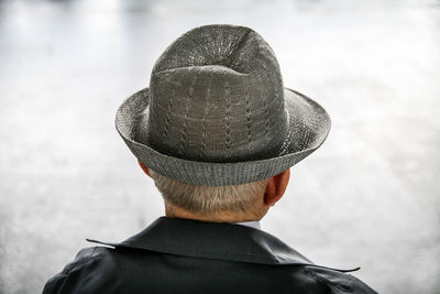 Rear view of man wearing hat