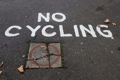 High angle view of no cycling text on road