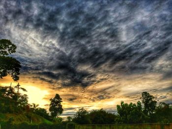 Low angle view of dramatic sky during sunset