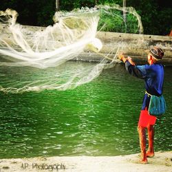 Woman playing in water