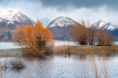 Scenic view of lake against sky. morning view of lake pukaki east bank.