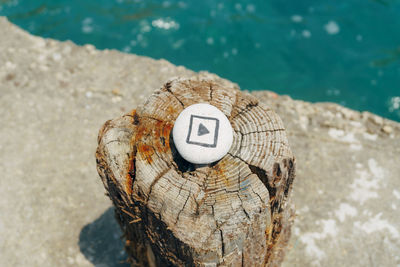 High angle view of rock by sea