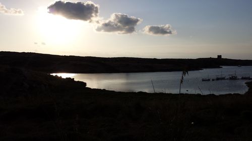 Scenic view of sunset over river