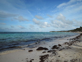 Scenic view of beach against sky