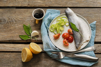 Directly above shot of fruits in plate on table