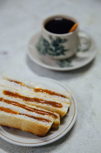 Close-up of coffee served on table