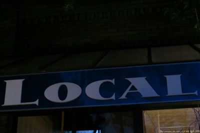 Low angle view of illuminated lights at night