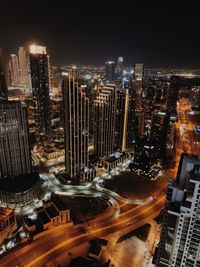 High angle view of illuminated cityscape at night