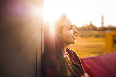 Close-up of smiling young woman