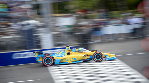 Blurred motion of toy car on road