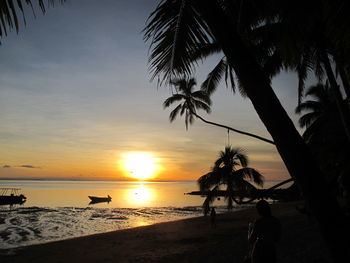 Scenic view of sea at sunset