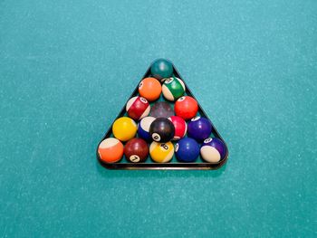 Close-up of multi colored balls on pool table