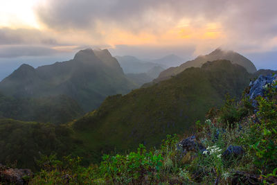 Scenic view of mountains against sky during sunset