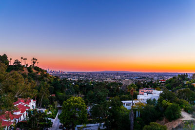 High angle view of townscape against sky at sunset