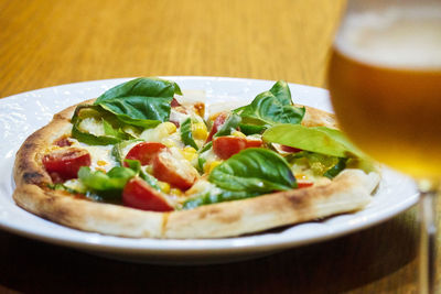 Close-up of pizza served on table