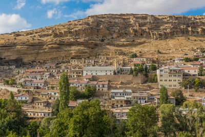 Aerial view of townscape against sky