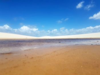 Scenic view of beach against sky