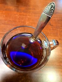 High angle view of drink in glass on table