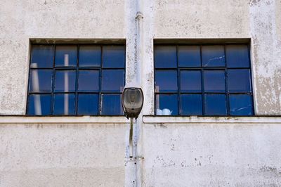 Street lamp on the facade in bilbao city, spain