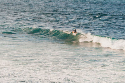 People enjoying in sea