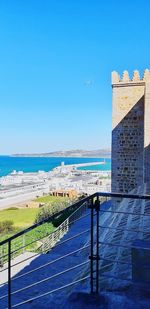 Scenic view of sea against clear blue sky