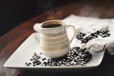 Close-up of cup on table