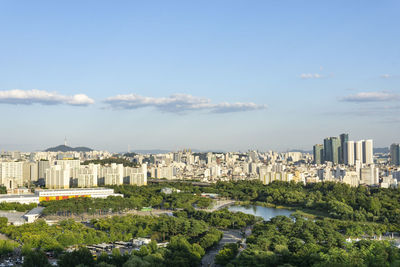 View of buildings in city against sky