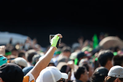 Rear view of people enjoying music concert