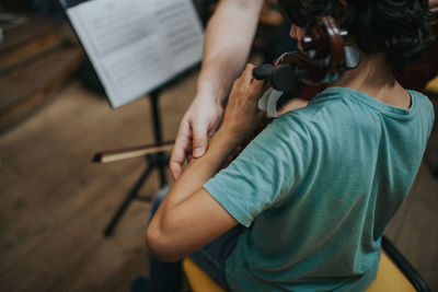 High angle view of people playing music in studio