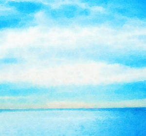 Scenic view of sea against blue sky