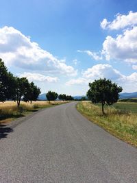 Empty road along landscape