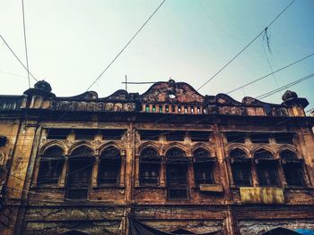 Low angle view of historic building against sky